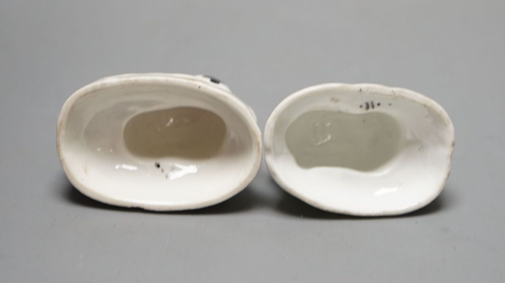 Two Staffordshire porcelain toy models of rabbits, c.1830–50, Provenance: Dennis G. Rice collection, 5 cms wide.